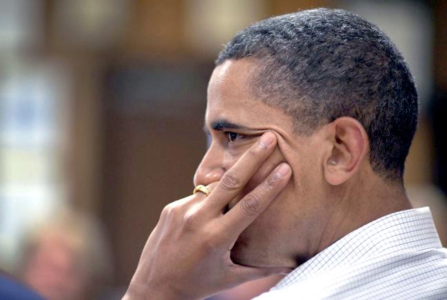 President Obama listens to a report on the impact of the BP oil spill on the Gulf Coast
