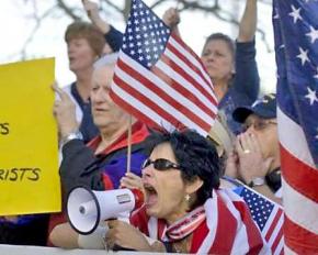 Anti-Muslim bigots harass attendees of a charity fundraiser at a community center in Yorba Linda, Calif.