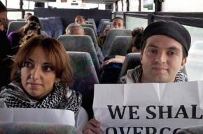 Gaza Freedom Riders on the bus with a sign reading "We Shall Overcome"